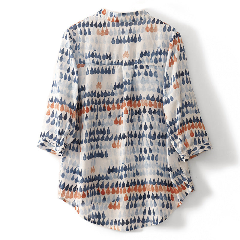 Casual printed blouse with relaxed fit shown on a model against a clean background, back view