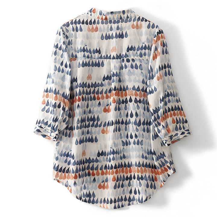 Casual printed blouse with relaxed fit shown on a model against a clean background, back view