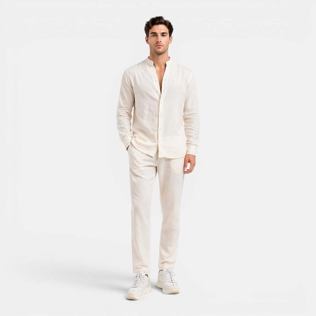 Male model wearing a lightweight two-piece outfit on a plain background.