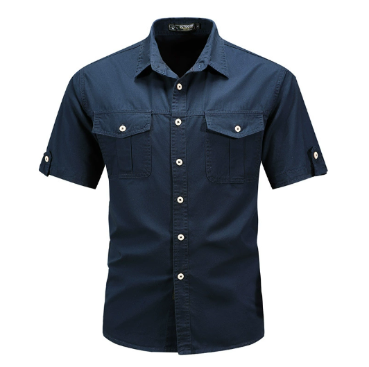  Male model styling a relaxed cargo button shirt with a camp collar on a plain background.