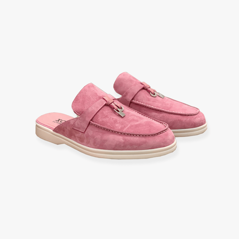 Casual mules with relaxed pose plain background.