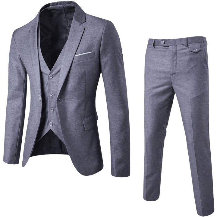 A polished suit set with lapel blazer, waistcoat, and streamlined trousers on a plain background.