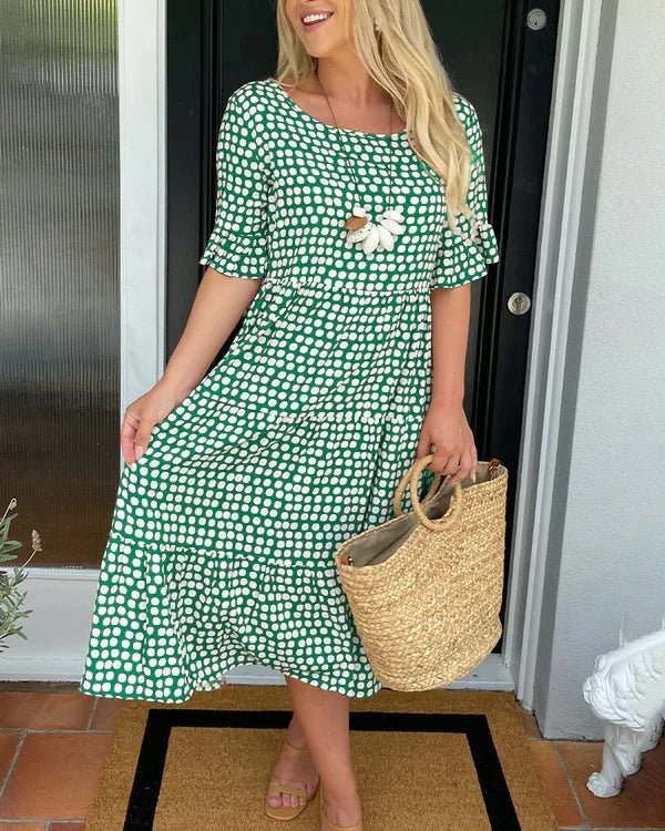 Casual green polka dot midi dress front pose