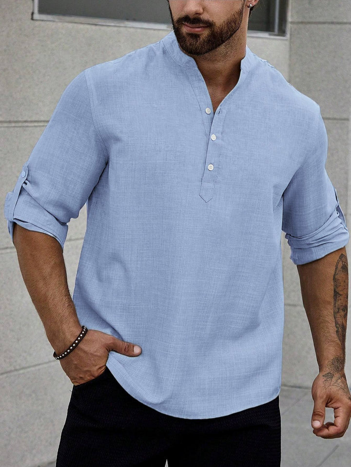 Male model wearing a classic collared shirt styled for everyday wear.
