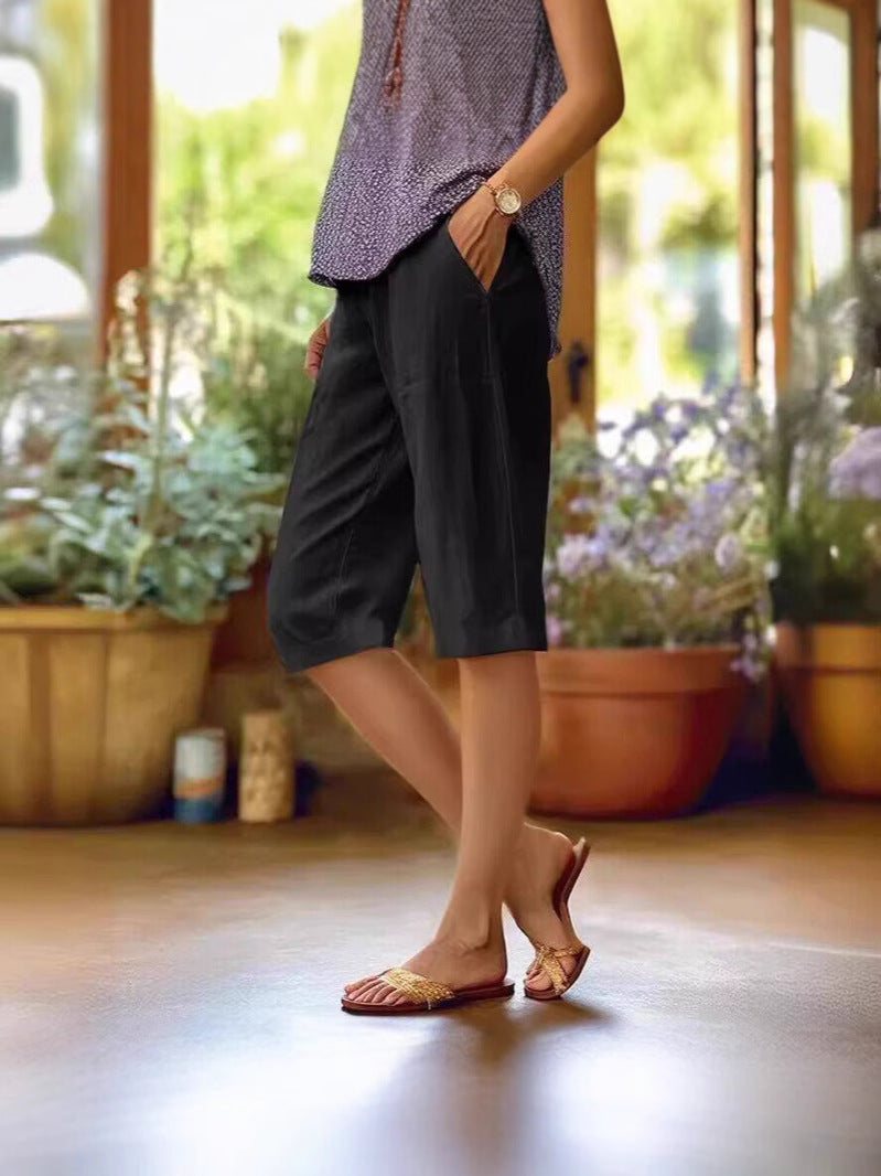 Summer wear black shorts front layout on nature background
