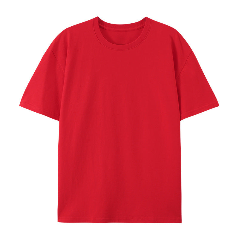 Woman in a relaxed-fit cotton T-shirt designed for versatile everyday styling.
