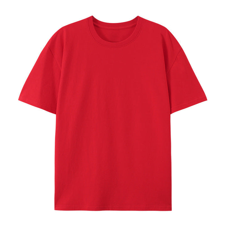 Woman in a relaxed-fit cotton T-shirt designed for versatile everyday styling.
