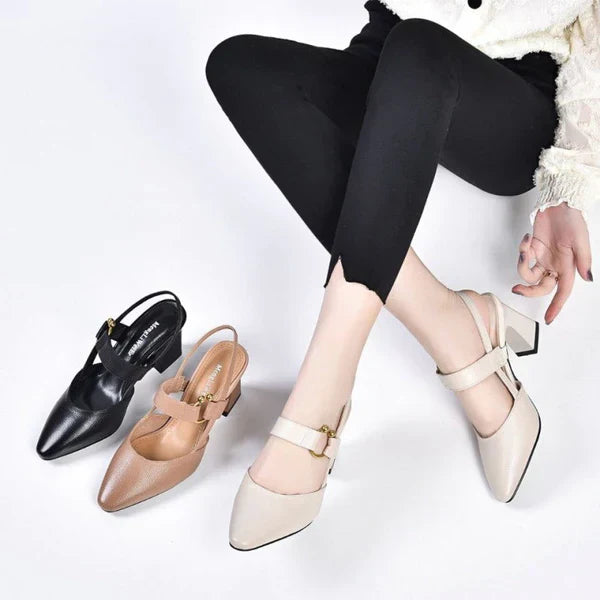 Minimalist sandals pose on plain background featuring three color heels