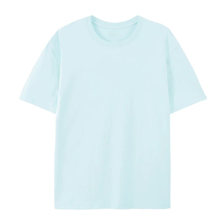 Woman wearing a loose-fit cotton T-shirt suitable for casual daily wear on a plain background.
