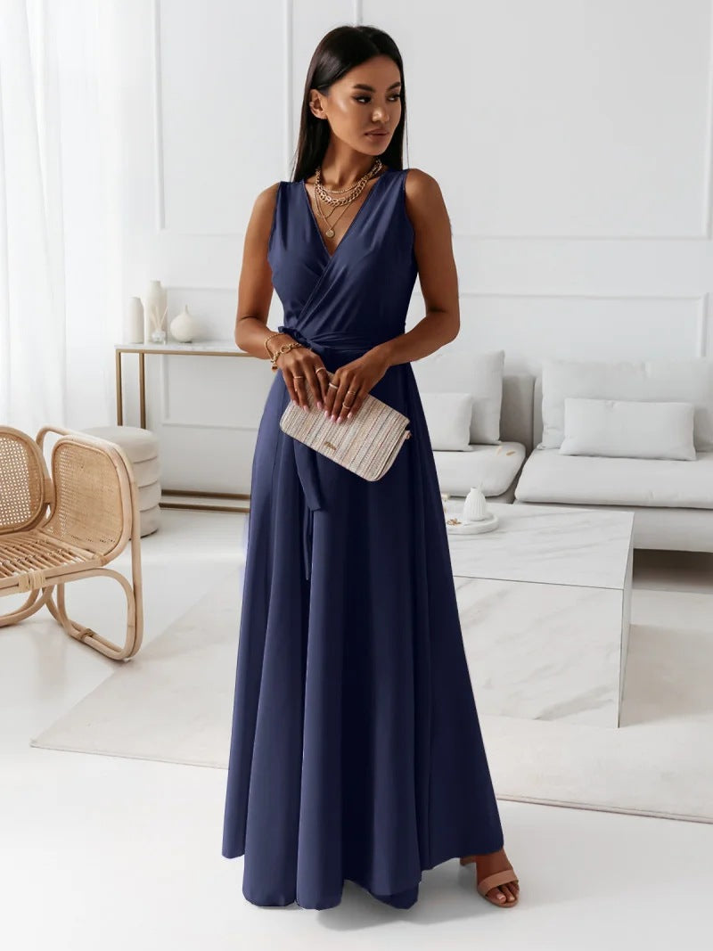 Female model displaying front angle of maxi dress, living room.