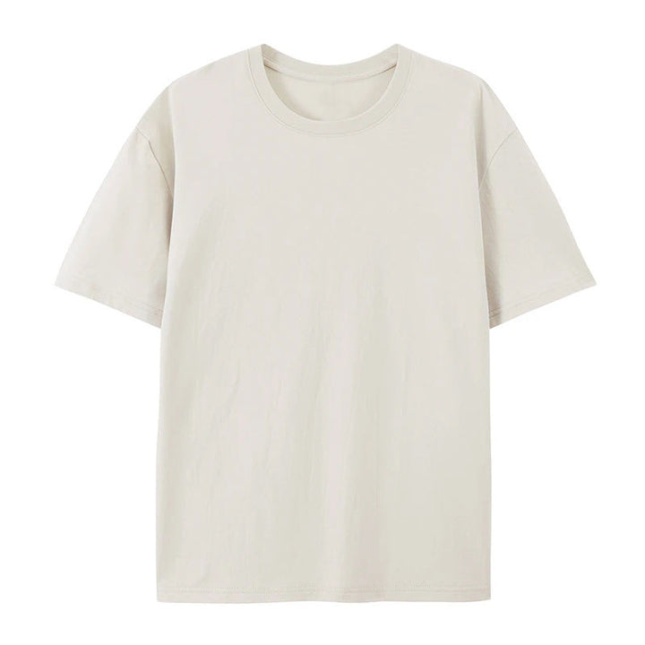 Female model in an oversized short-sleeve T-shirt with a relaxed shape and clean design.
