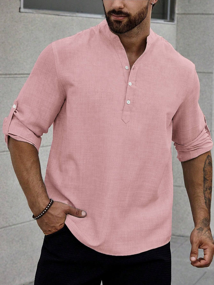 Man in a smart casual shirt with a clean and contemporary design.

