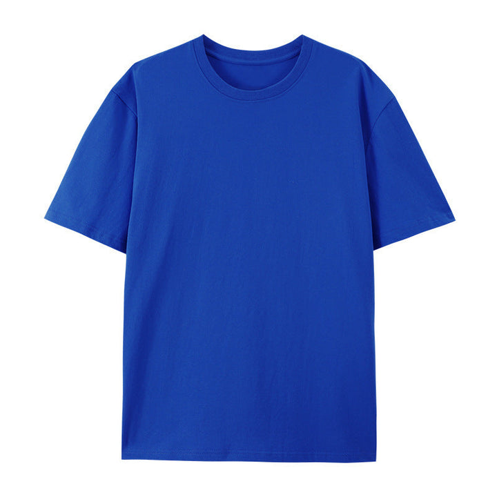 Woman wearing a casual cotton T-shirt with a loose and comfortable fit on a plain background.