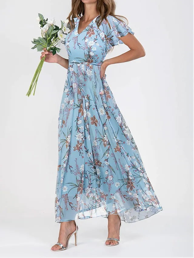 Woman presenting a versatile midi dress on a plain background.