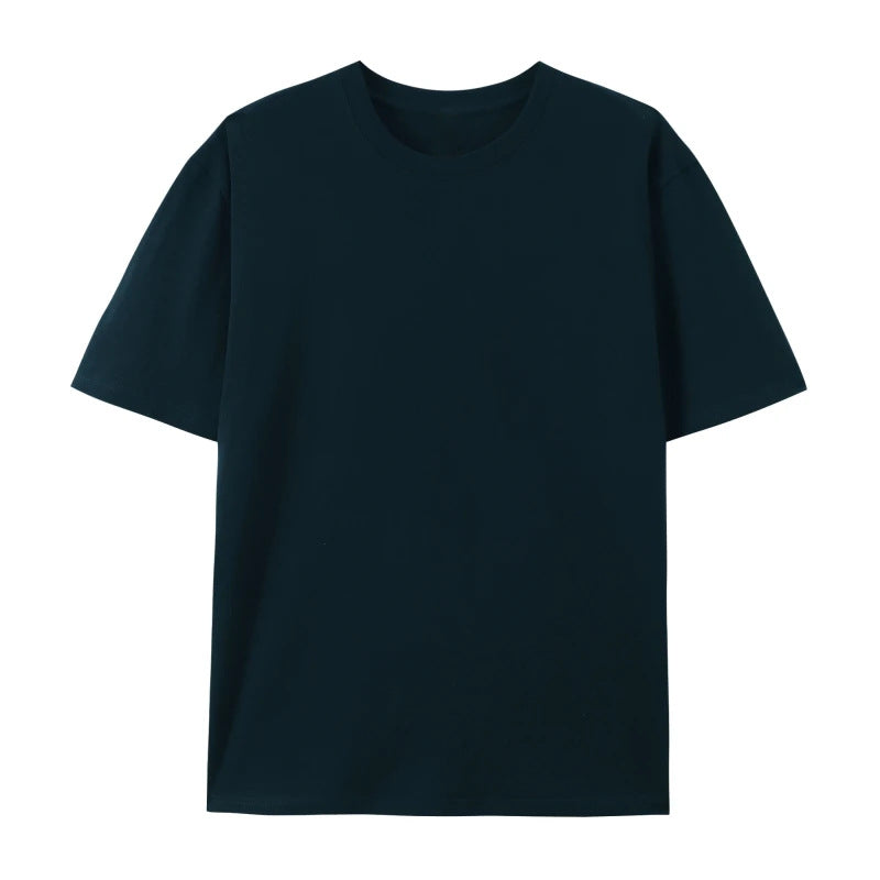 Female model wearing an oversized cotton T-shirt with a relaxed fit against a plain background.
