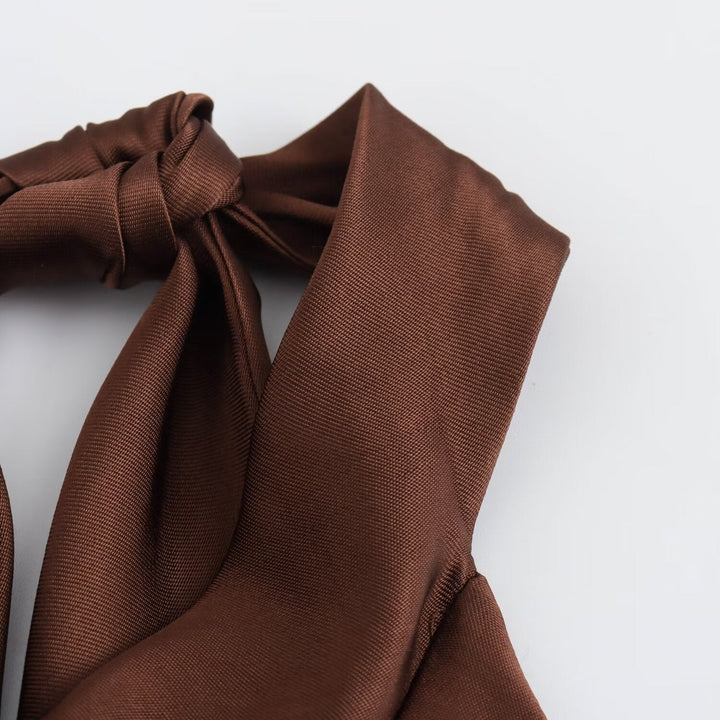 Brown halter upper angle view, maxi dress with flowing silhouette