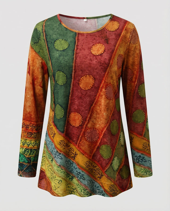 Female model in a vibrant casual tunic with a round neckline and relaxed fit.