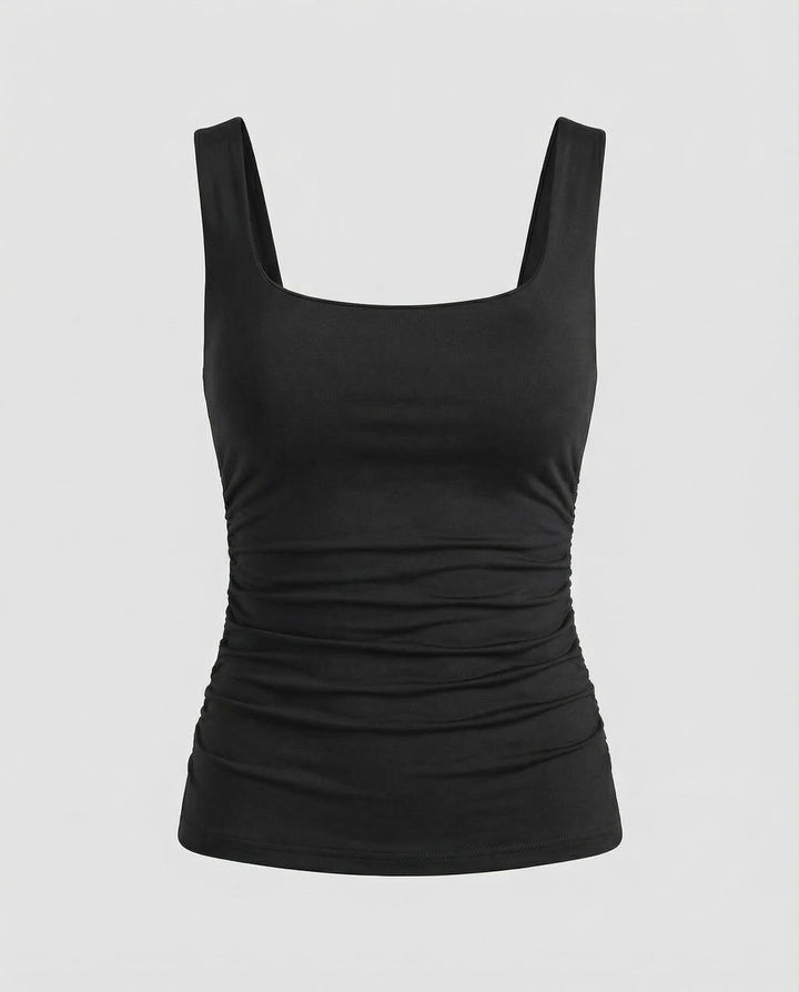 Female model showcasing a fitted casual top with a modern square neck design.