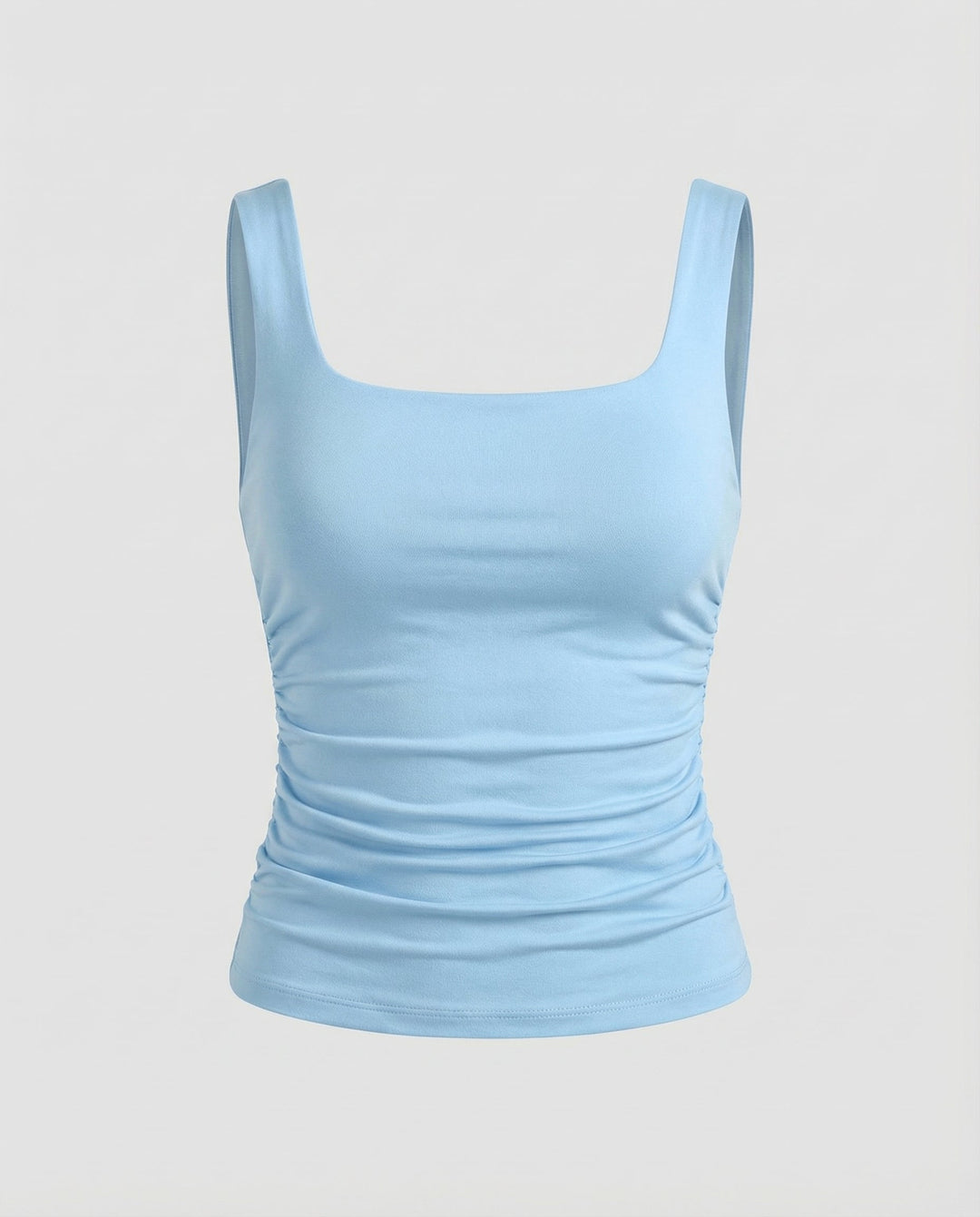 Female model in a fitted square neck top styled for everyday wear.
