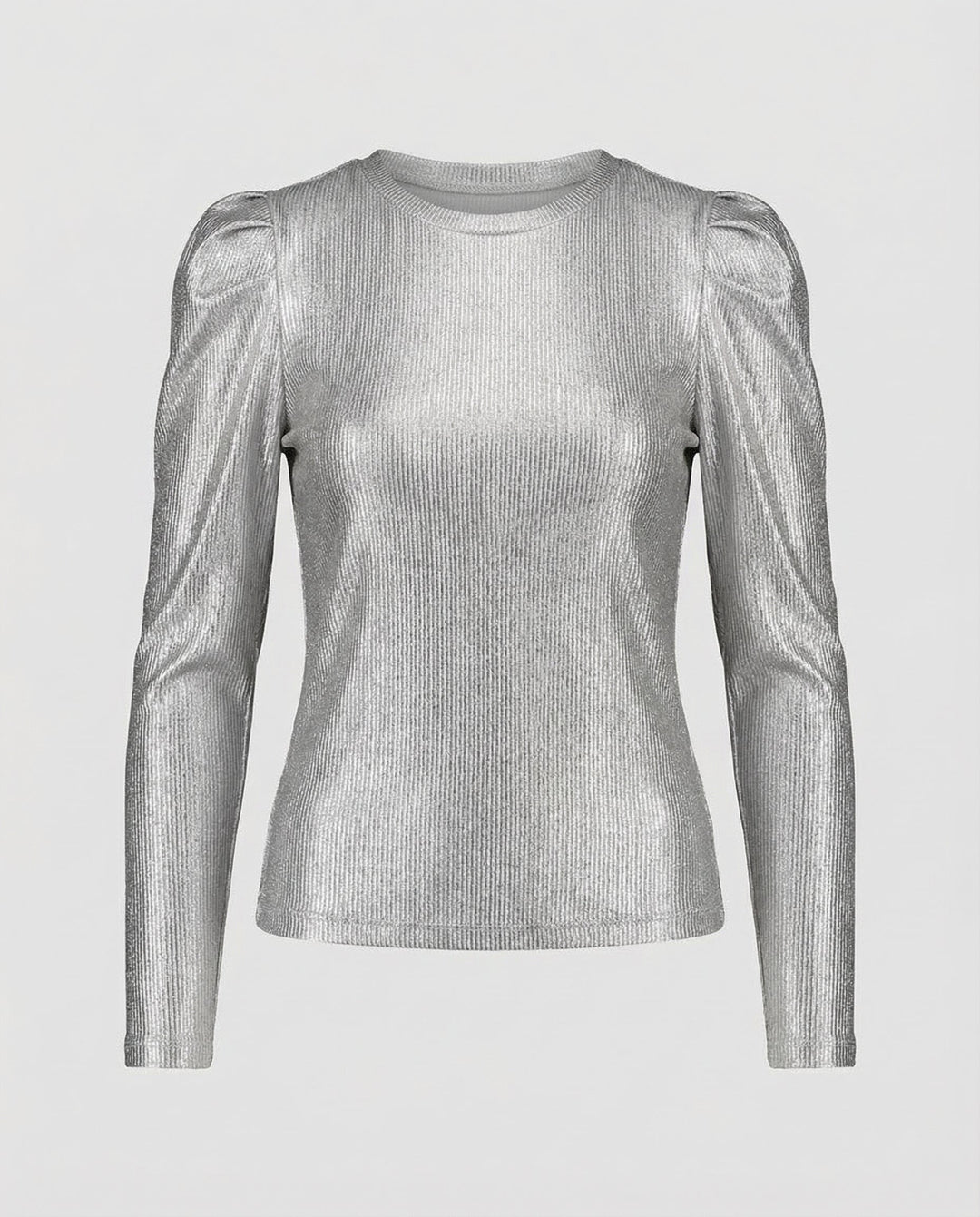 Female model in a shimmering blouse styled with dramatic puff sleeves.
