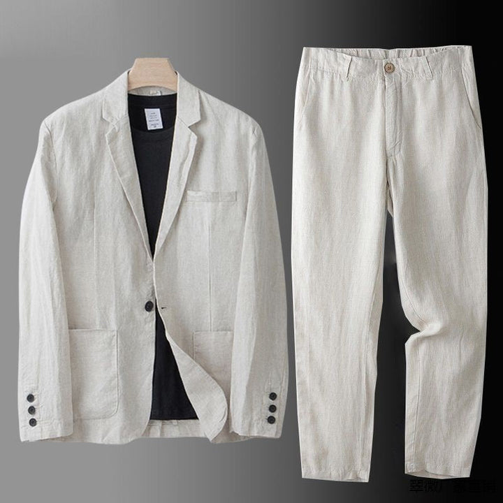Male model wearing a linen blazer and matching trousers on a plain background.