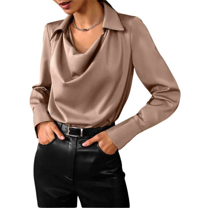 Woman modeling an elegant satin blouse with draped neckline on a clean background.