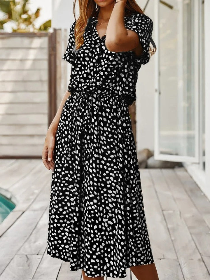 Breezy printed midi dress with short cuffed sleeves