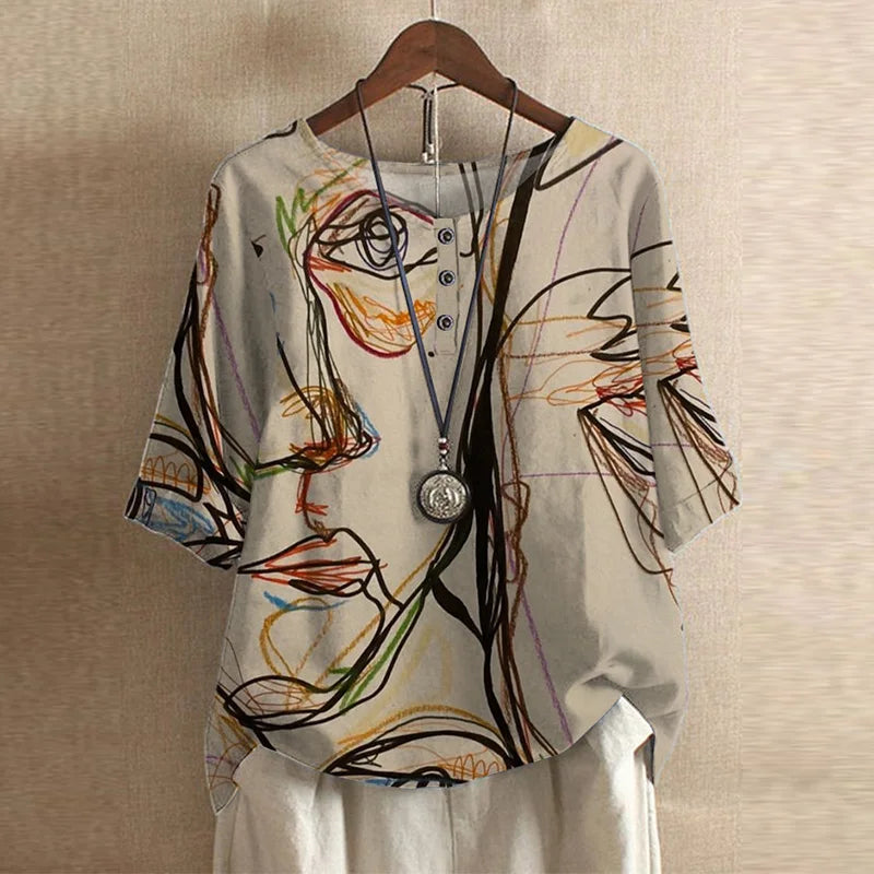 Front display of loose floral women’s top