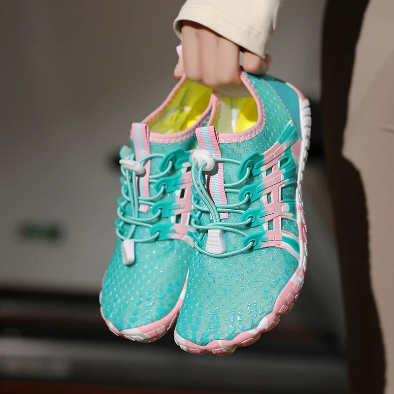 Flexible swim shoes shown on a plain background.