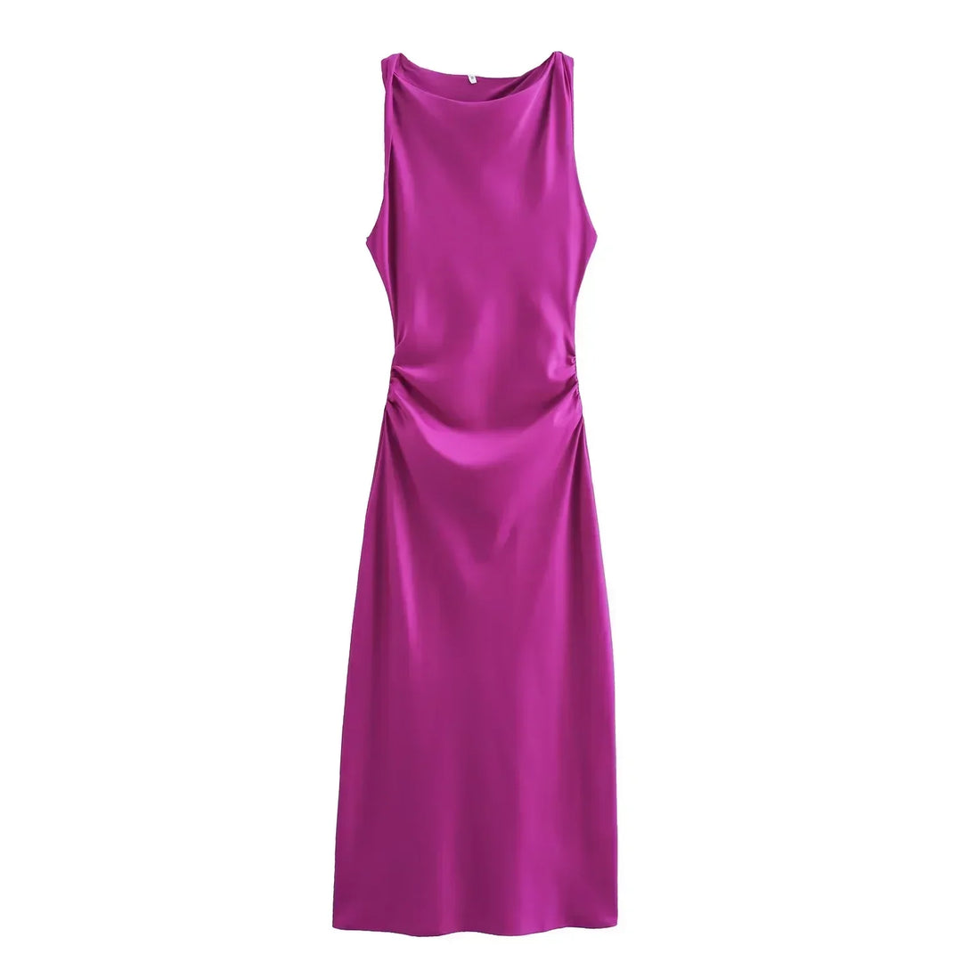 Minimalist midi dress on a plain background.