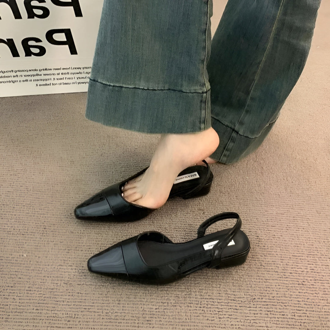 Foot model standing showing full shoe shape plain background