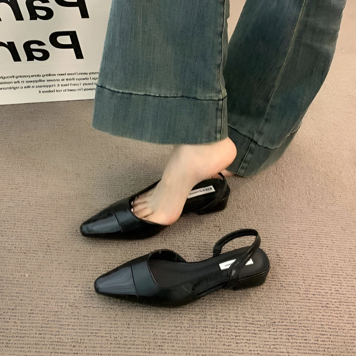 Foot model standing showing full shoe shape plain background