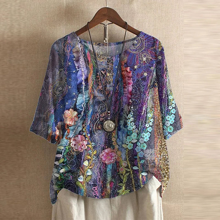 Artistic women’s top with soft botanical starry print