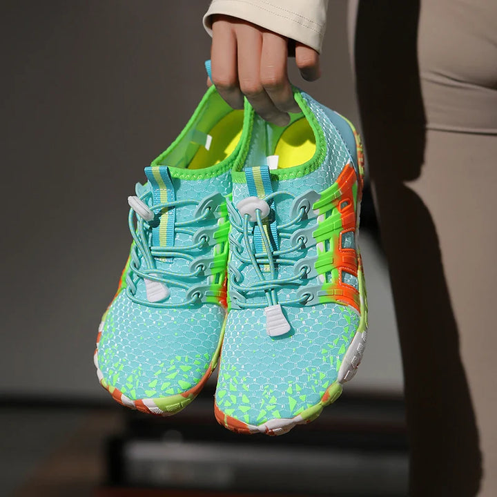 Lightweight beach walking shoes on a clean background.