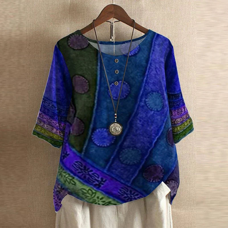 Relaxed fit blouse with floral hem accents