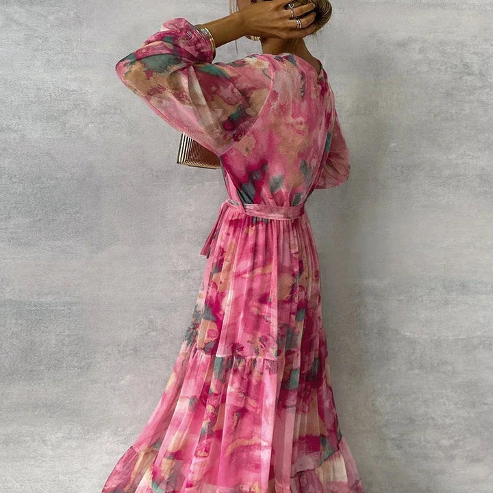 Tiered skirt dress back angle hanging plain background centered