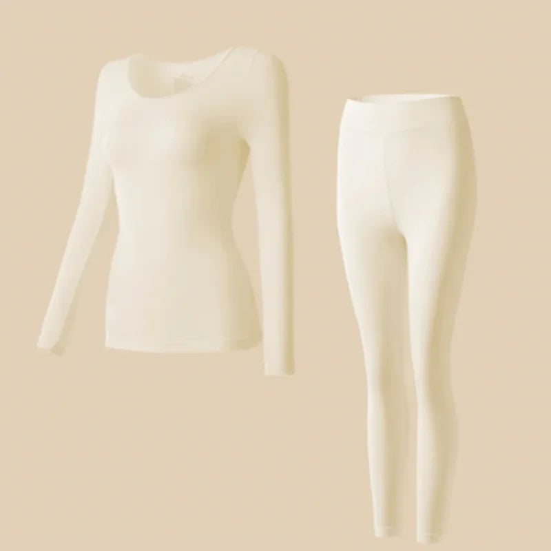Fitted top and matching leggings for cold days on a plain background.