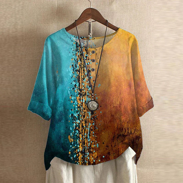 Front angle dual color women’s blouse with retro print