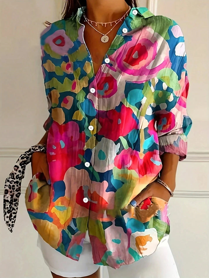 Three-quarter view of multiple blouse on clean background