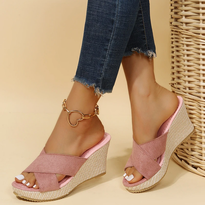 Female model showcasing strap sandals with a clean everyday look.