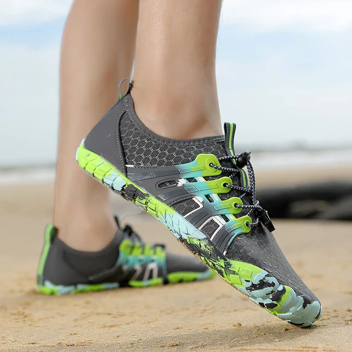 Non-slip pool shoes on a plain background.