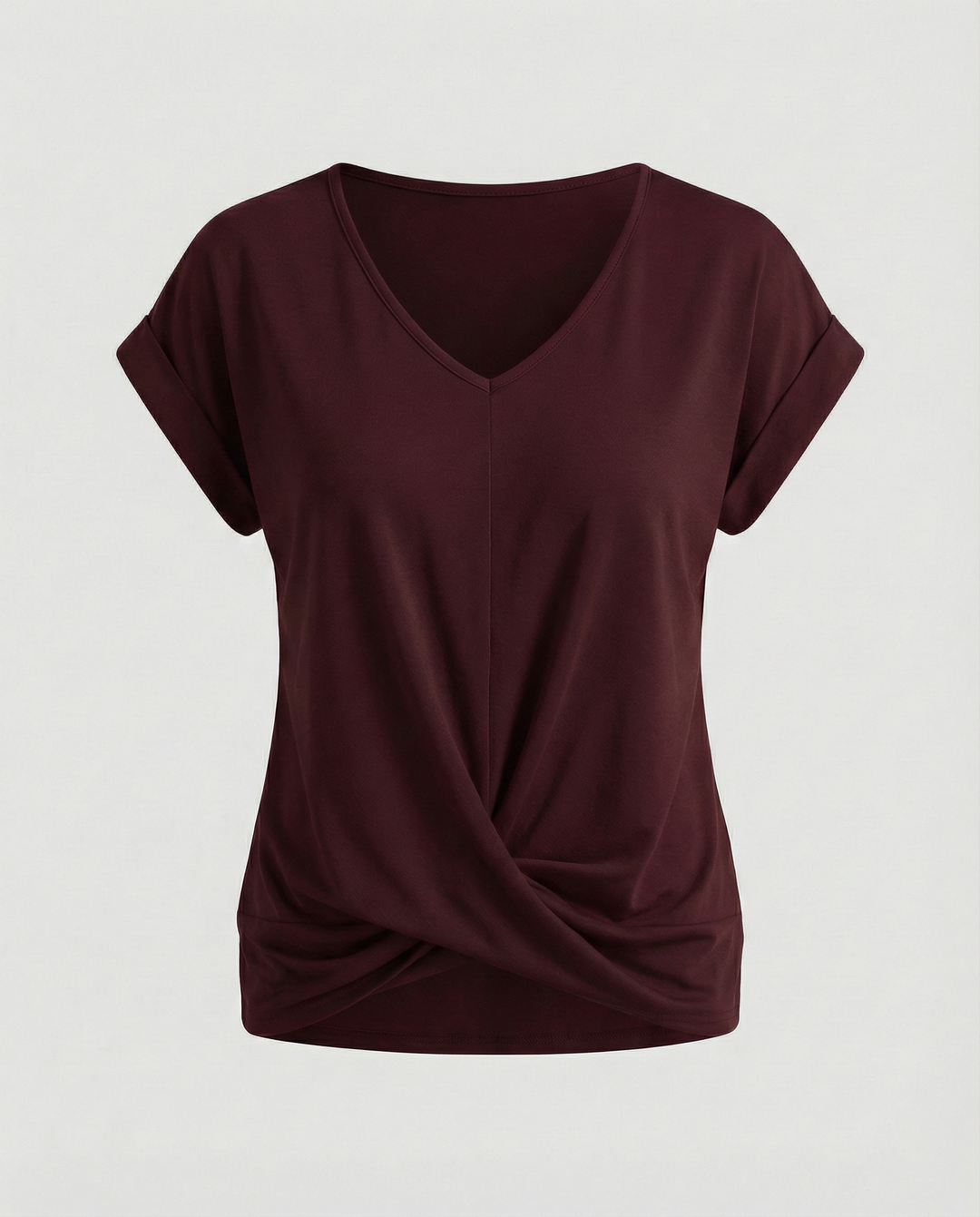 Woman in a short sleeve blouse with a timeless and elegant appearance.