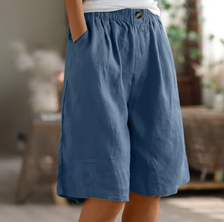 Elastic waist blue shorts detail