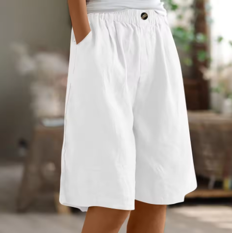 Relaxed white shorts front view