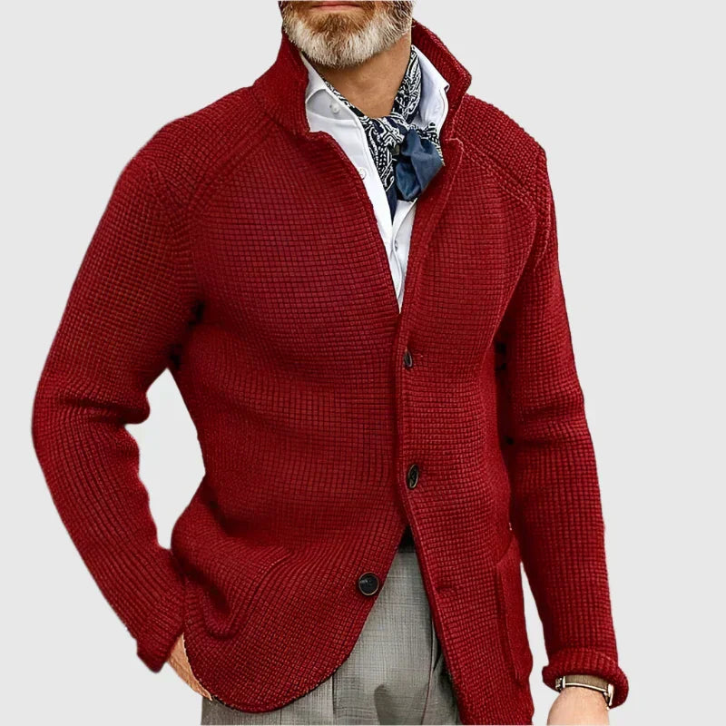  Man showcasing a summer-ready linen outfit with a neat finish on a plain background.