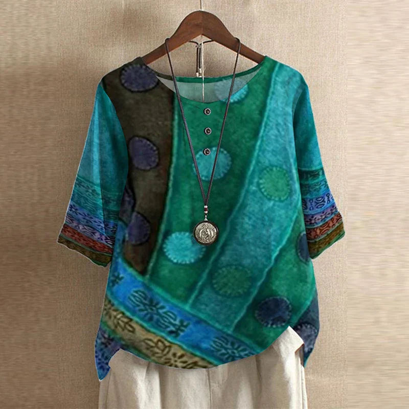 Loose green top with delicate floral pattern