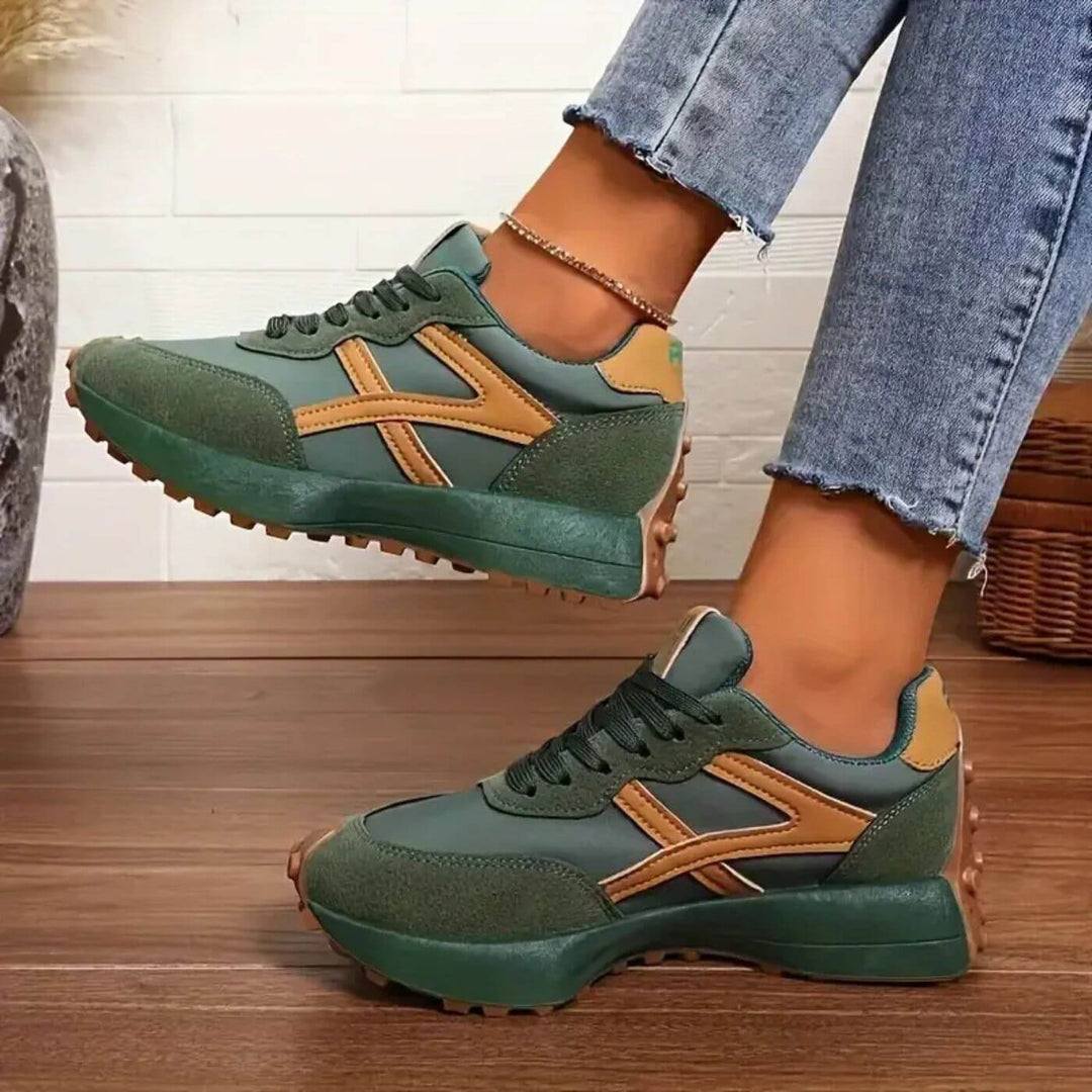Neutral green lace-up shoes with durable outdoor tread pattern