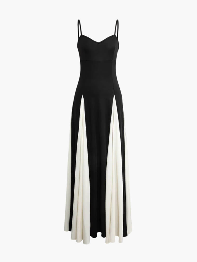 Studio photo of a sleeveless formal dress with flowing fabric.