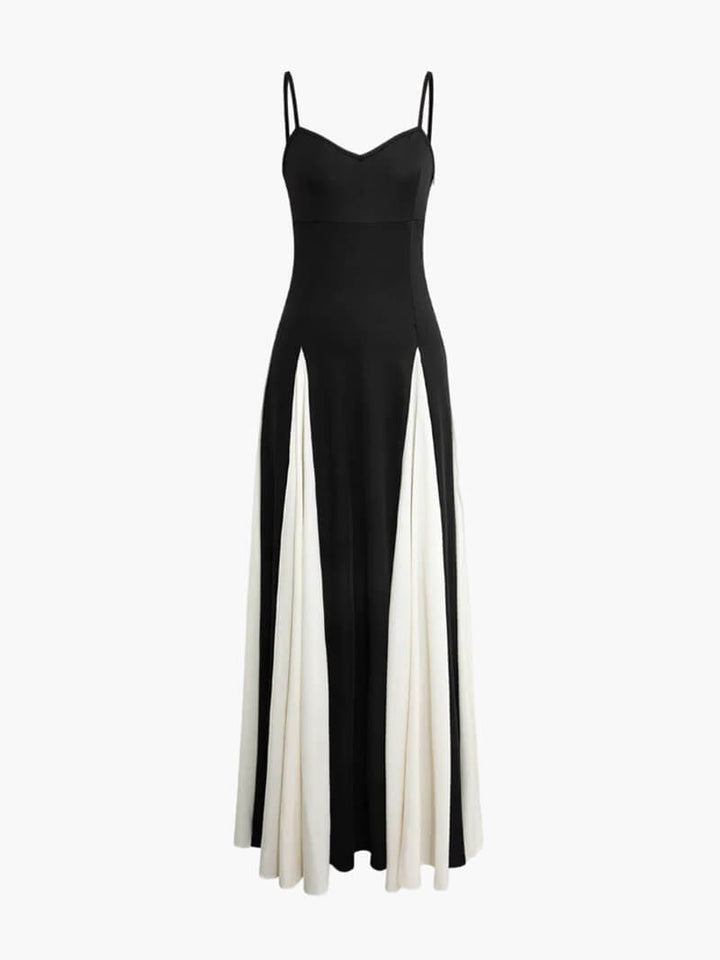 Studio photo of a sleeveless formal dress with flowing fabric.