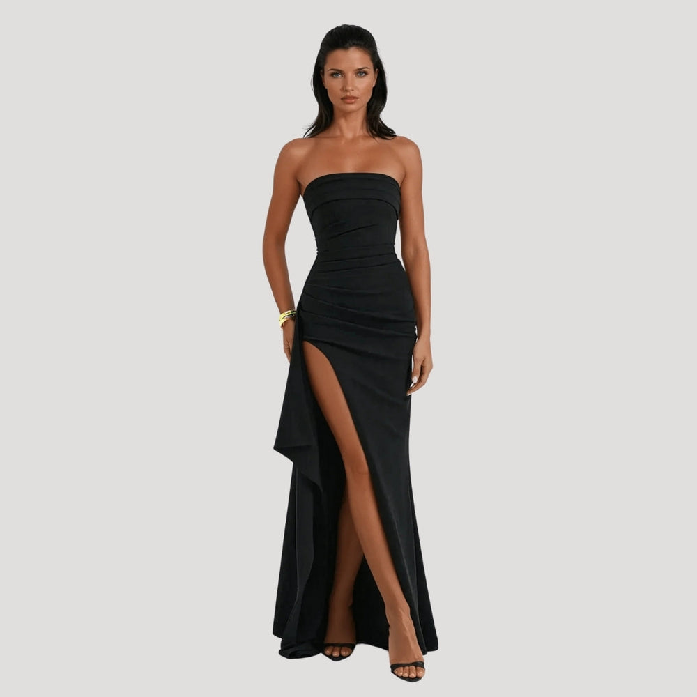 Model posing front angle long gown plain background minimal studio